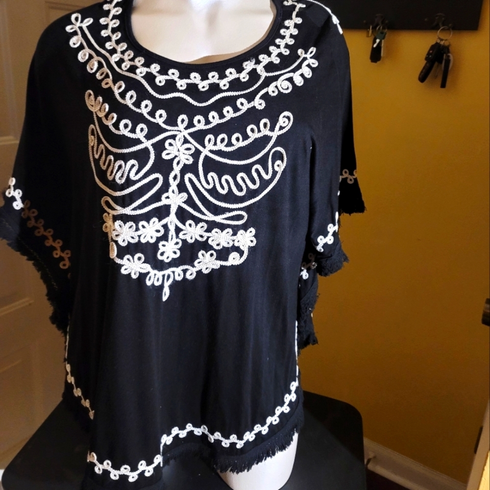 Black and white poncho